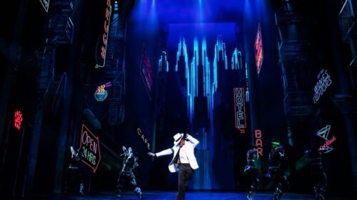 MJ company dancing on the stage